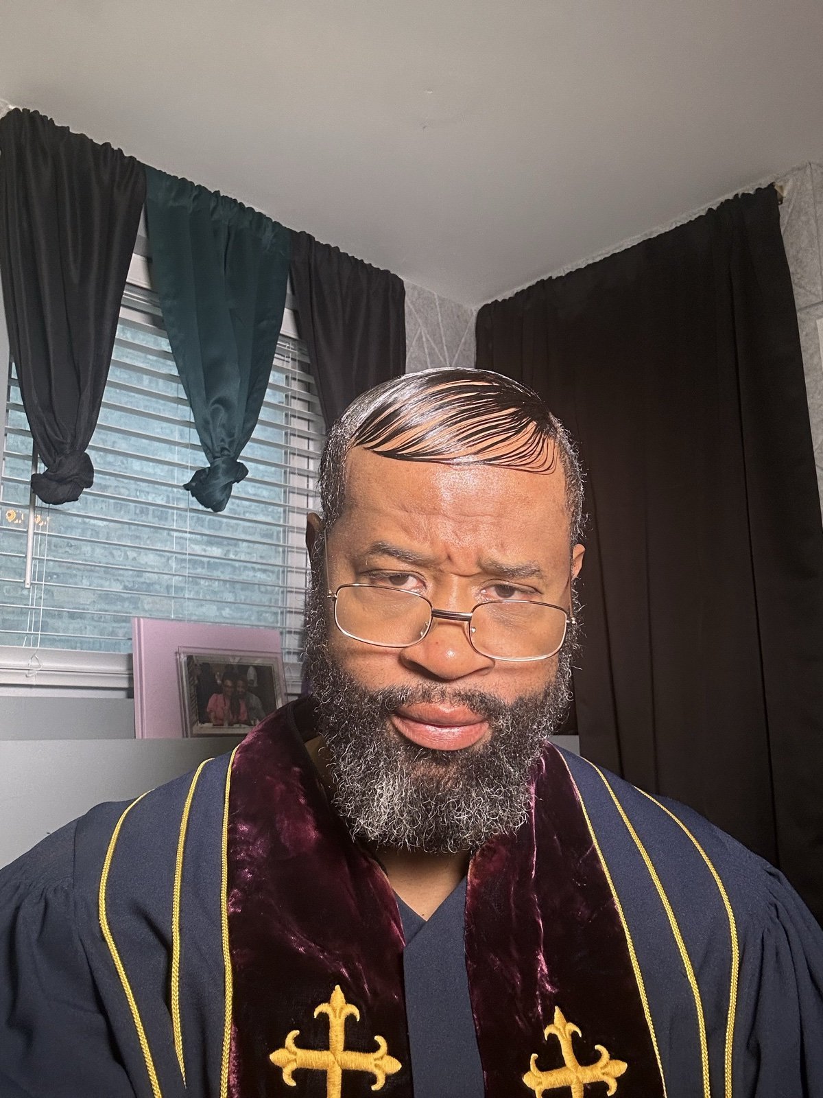 Pastor Leviticus in his robe